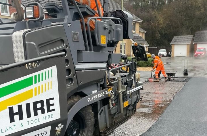 Road surfacing asphalt paver hire